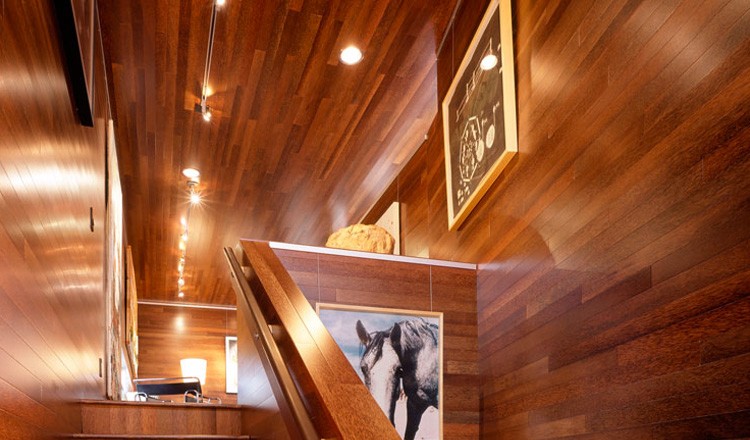 palmwood paneling on artist loft ceiling, walls, and floor